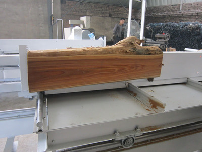 工圆木推台锯的应用如何提高木材锯切效率